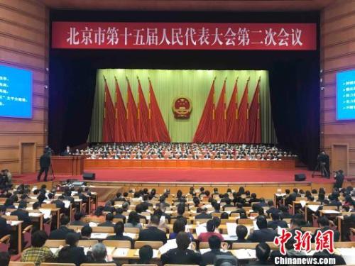 北京市十五屆人大二次會議14日開幕。北京市長陳吉寧向大會作政府工作報告。　尹力 攝